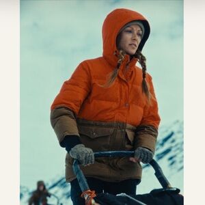 New Filson womens waxed down parka, size medium. Orange and brown.